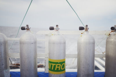 Nitrox tanks on a boat.