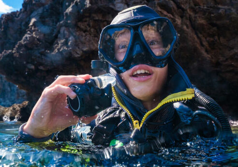 Teenage boy diving